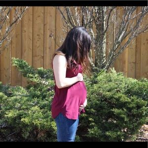 Burgundy sleeveless maternity blouse
